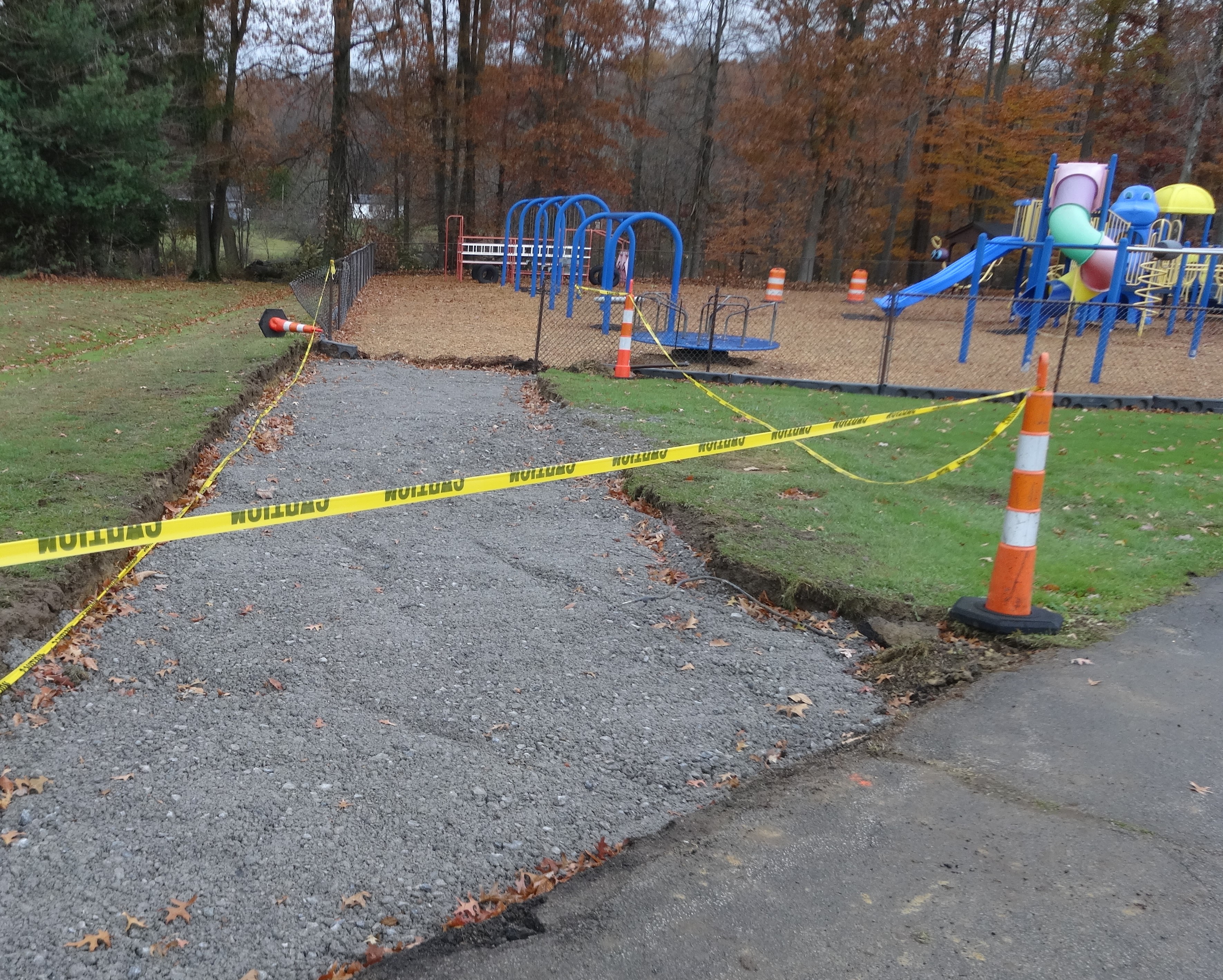 Brookfield Road Department workers ripped out the walkway to Jenny Junction playground in the township park, and will replace it in the spring.