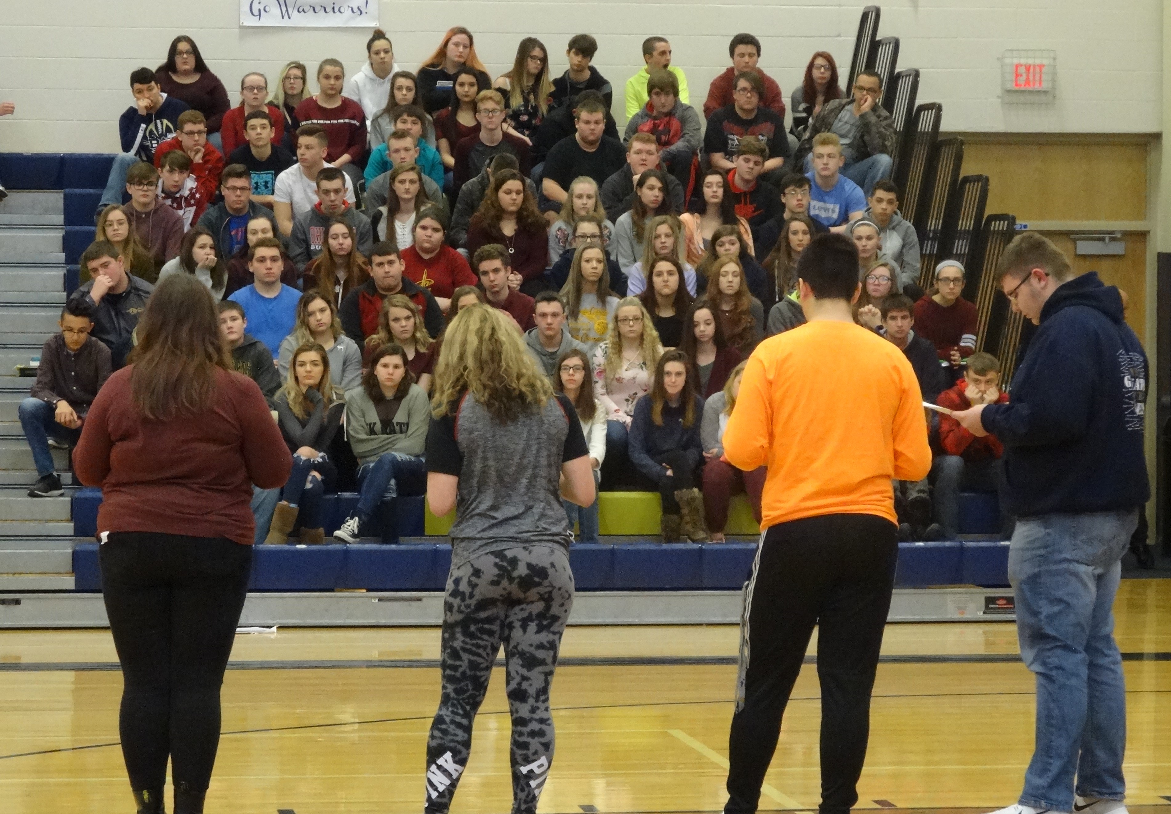 Student organizers of Brookfield High School's National Walkout Day observance address their classmates.