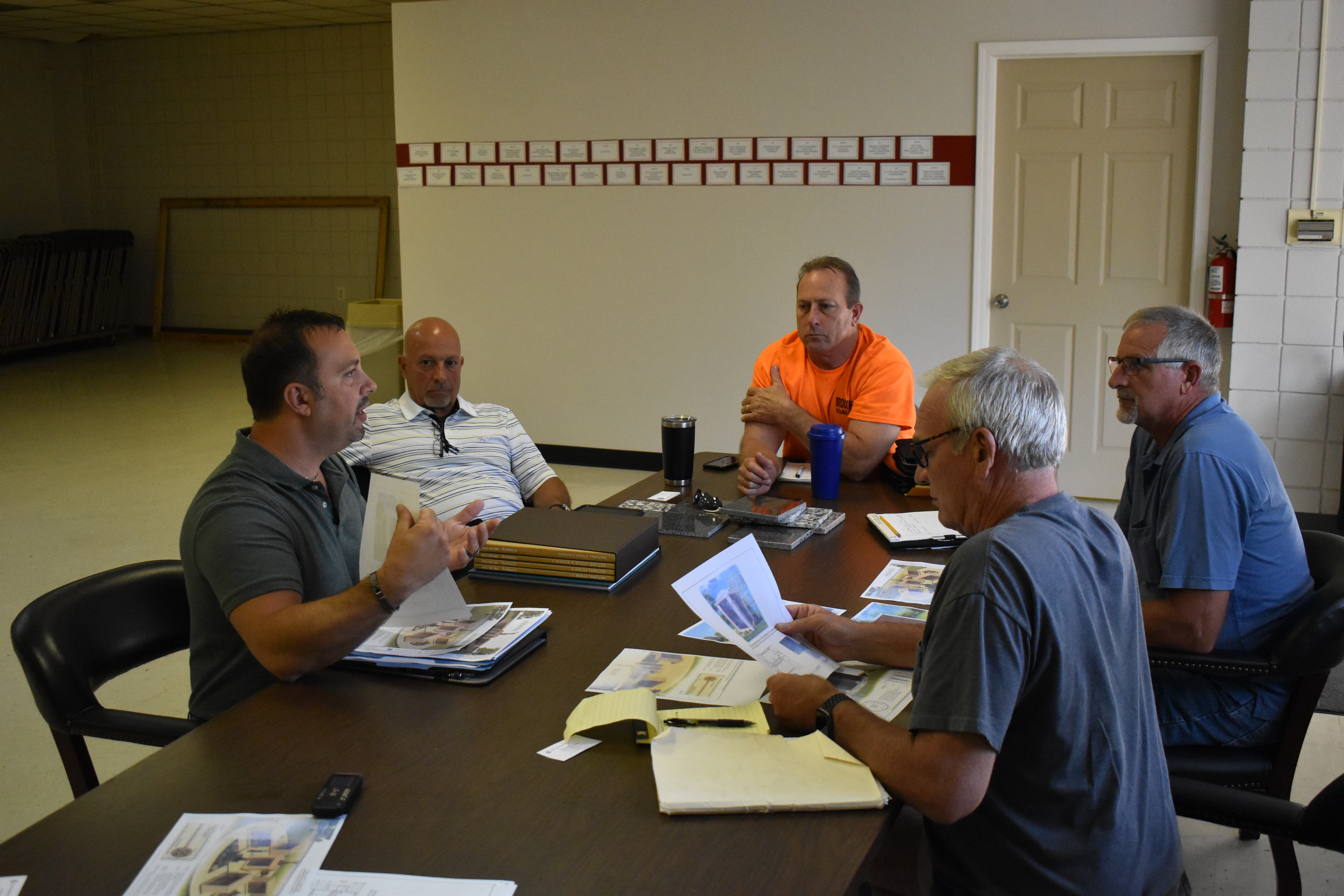 Dave England, left, of Coldspring USA, explains to Brookfield Township officials their options in choosing an columbarium, a mausoleum for cremated remains. Also shown are, from right, Trustees Ron Haun and Dan Suttles, Cemetery Sexton Jaime Fredenburg and consultant Jim DeChristefero.