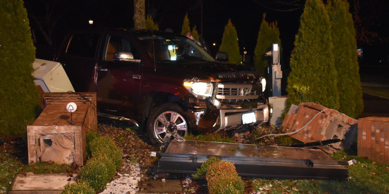 Truck wipes out township sign