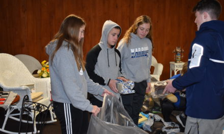 Basketball parents collect shoes for fundraiser