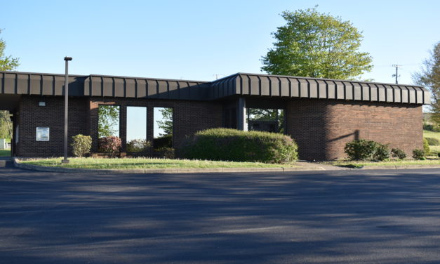School buys bank building for administrative offices