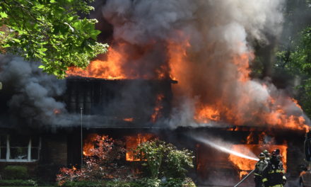 Explosions, fire destroy home