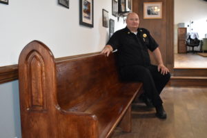 Brookfield Fire Chief David Masirovits sits on the bench he reworked for use at fire Station 18.