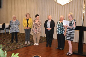 Ohio Federation of Women's Clubs State President Yvonne Ford, at right, installs officers, from left, Ruth Hawkins, Chris Trinckes, Melissa Sydlowski, Rene Martin and Carrie Davis.
