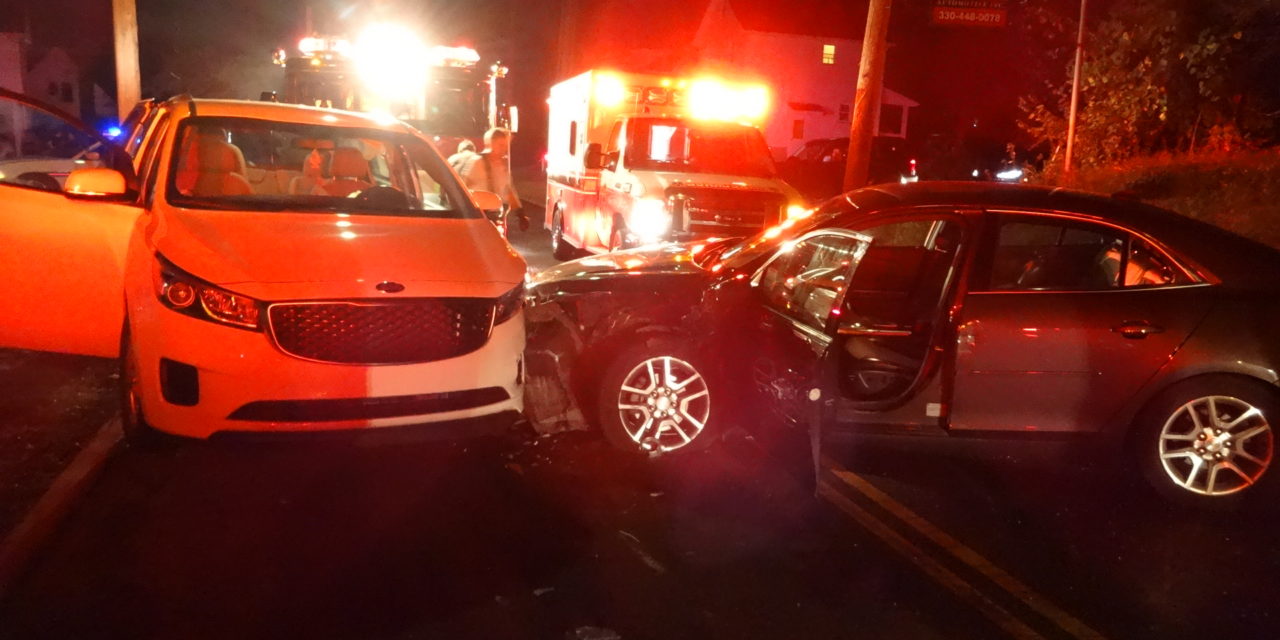 Woman taken to hospital in 2-car crash