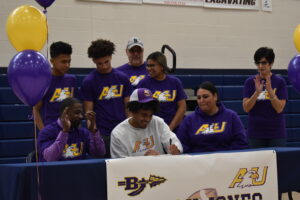 Isaiah Jones signs a letter of intent to play football for Ashland University.